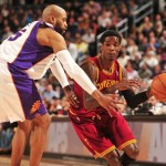 Manny Harris Manny Harris races around Vince Carter's textbook defensive stance.