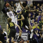 Terrence Ross gets two fingers in the eye against Oregon (AP Photo - Ted S. Warren)