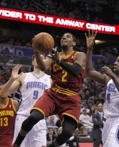 Nikola Vucevic, Andrew Nicholson, Kyrie Irving Kyrie helped lead the Cavs to an easy victory against the Magic.